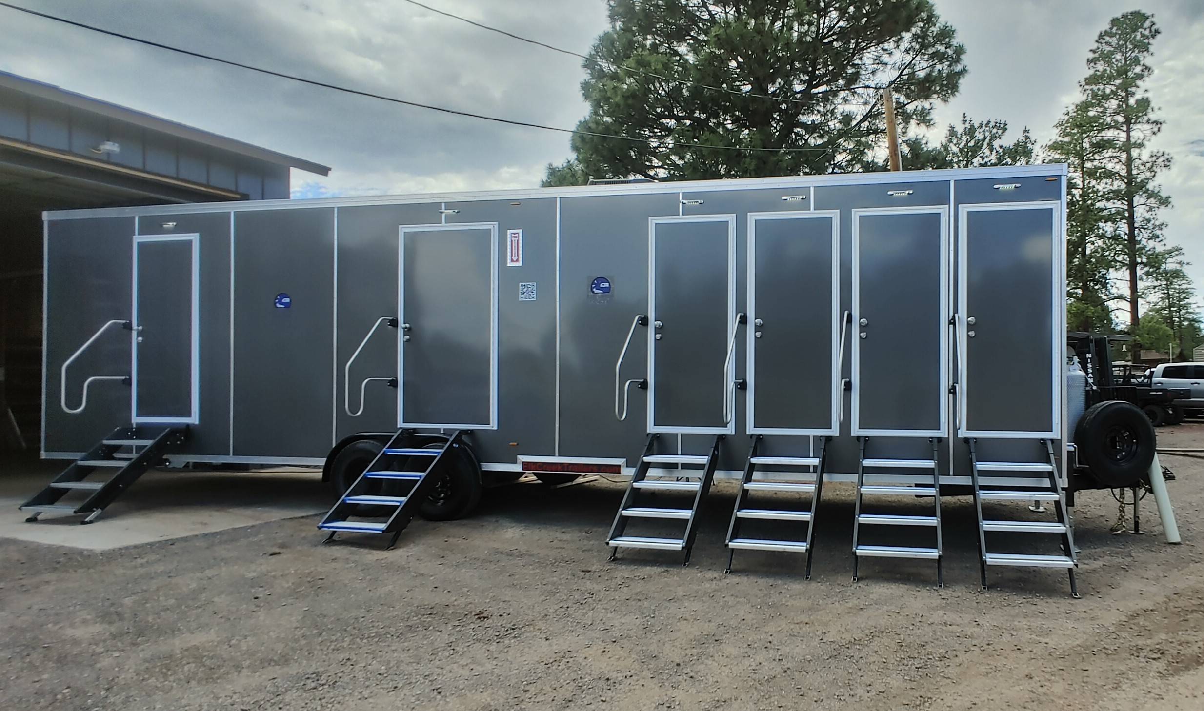 a black restroom trailer